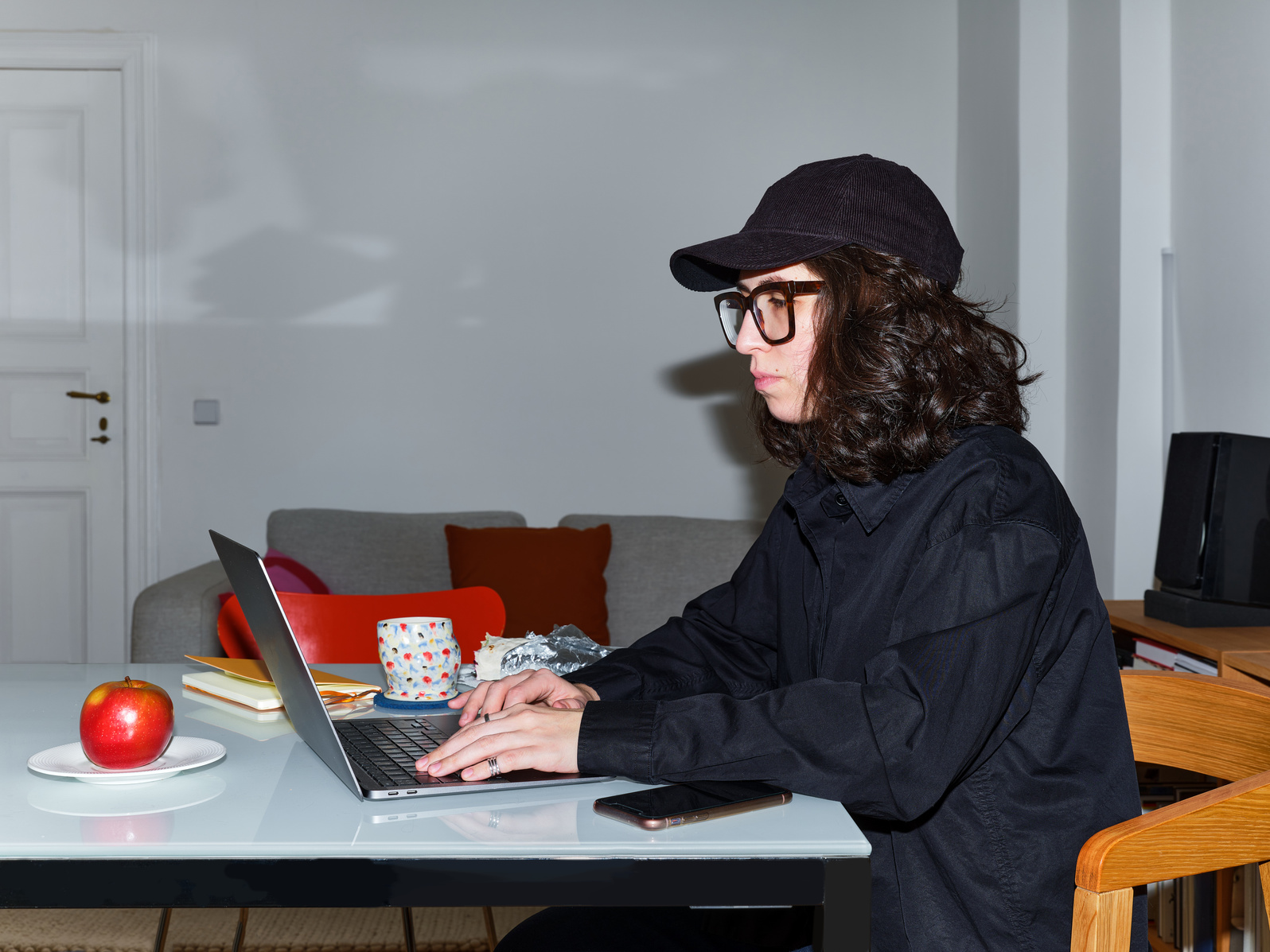 Woman Working on a Laptop at Home